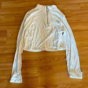 Cropped halfway zip up long sleeve shirt.
